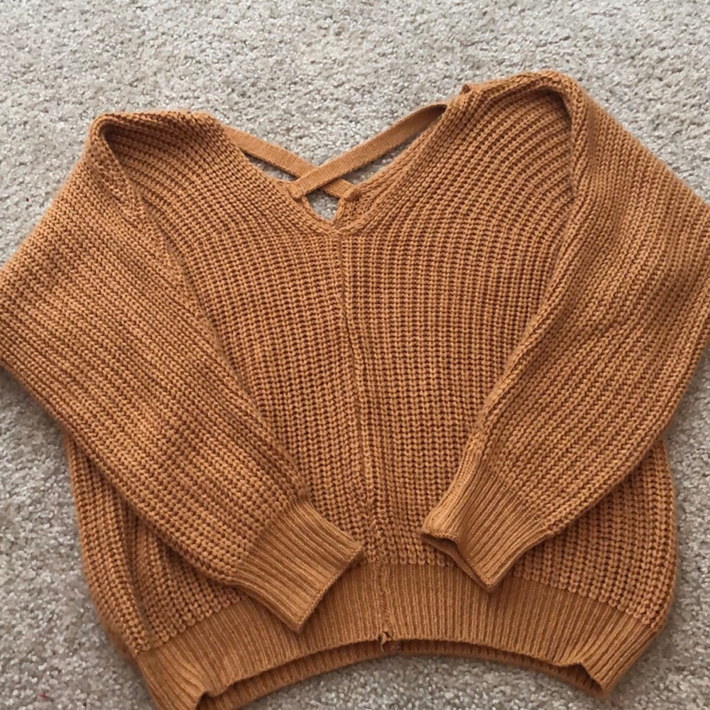 Orange sweater with crossed back!